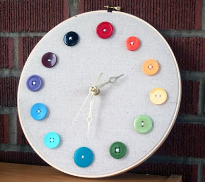 embroidery hoop clock with rainbow buttons