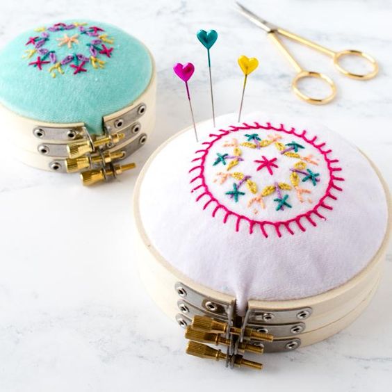 Pretty Embroidery Hoop Pincushion Tutorial with handstitched details.